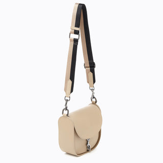 Botkier trigger-saddle-crossbody_latte_3_front-angle-web-strap-view.jpg