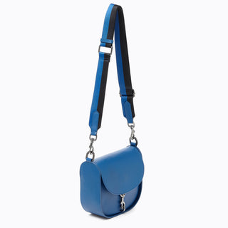 Botkier trigger-saddle-crossbody_sapphire_3_front-angle-web-strap-view.jpg